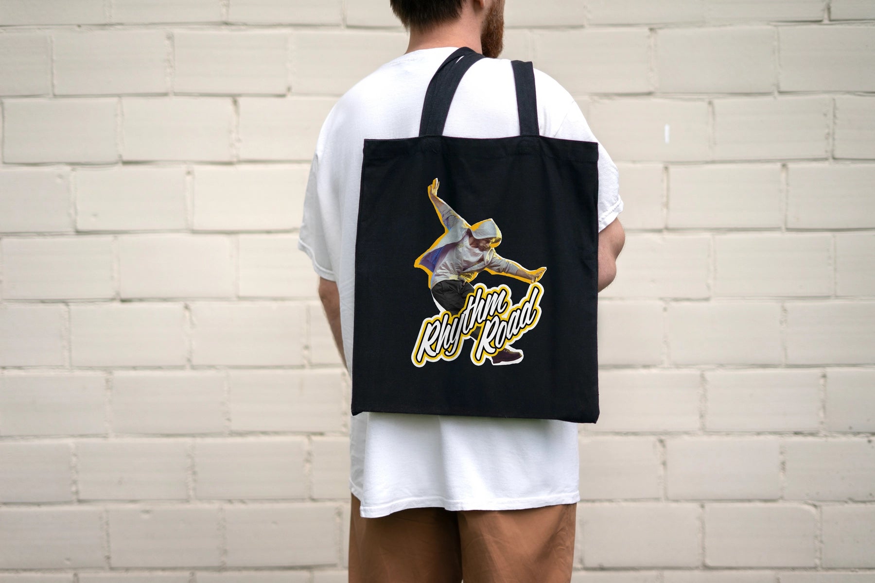 Man holding a tote bag made with BN2 Series