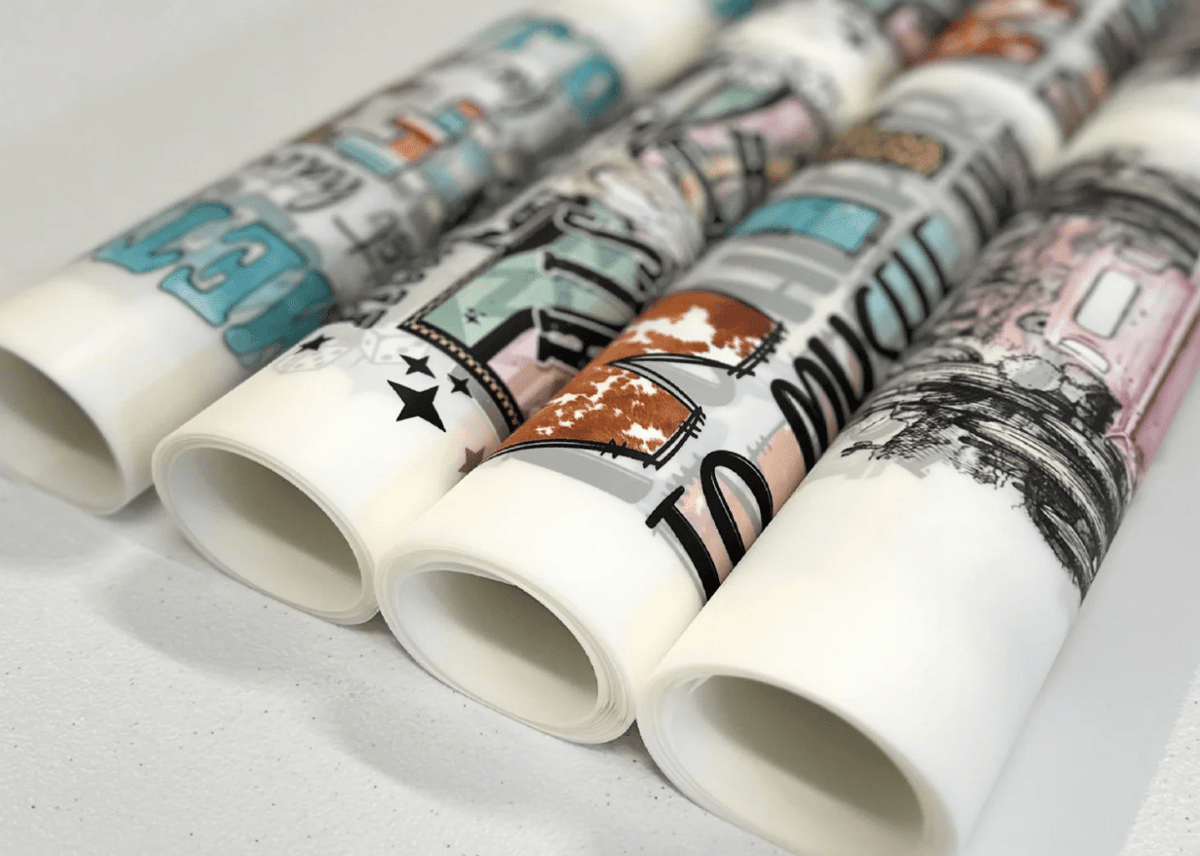 Rolled ready-to-press DTF gang sheet transfers produced by GPI Supplies